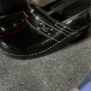 Dansko Black Patent Leather Clogs